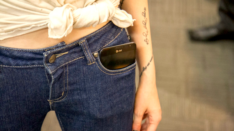 Illustration for article titled Giant Smartphones in Skinny Jeans: A Photoshoot